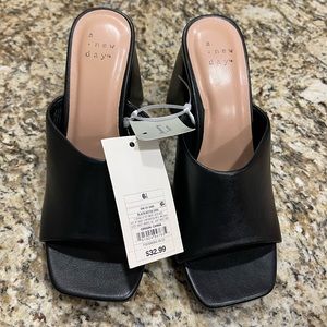 Beautiful black New heels never worn with tags